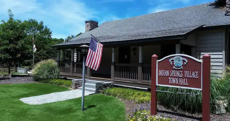 Building with an American flag in Indian Springs Village, Alabama